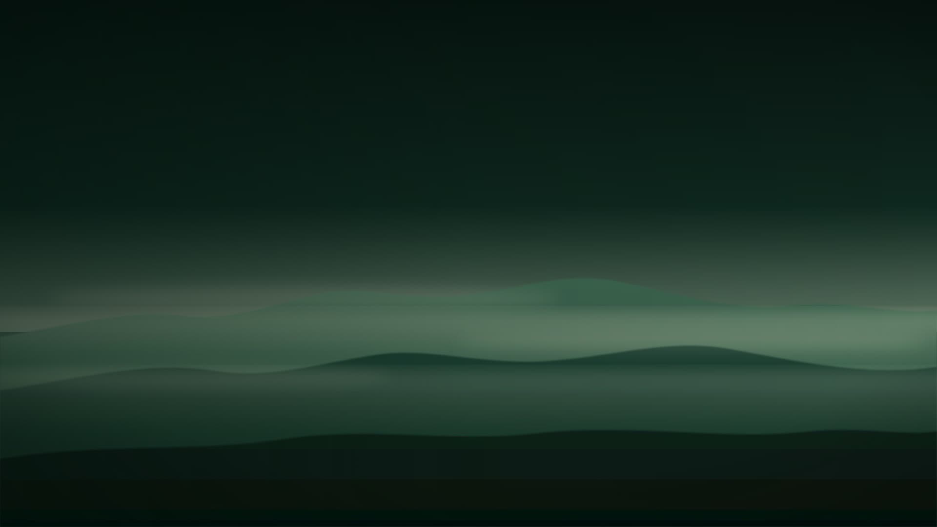 Layers of green mountain ridges under drifting mist at dusk